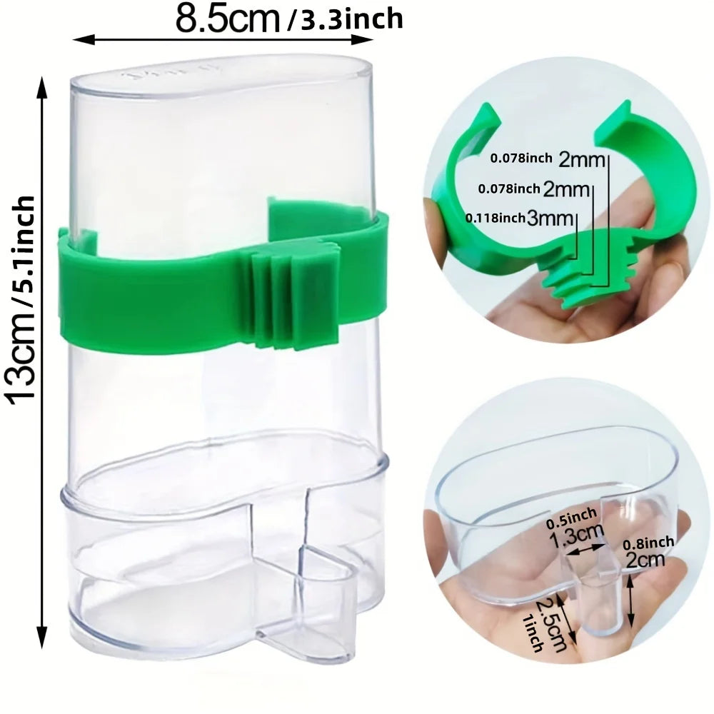 Clear plastic bird feeder cup with a bright green adjustable clip attachment, showing dimensions and parts.