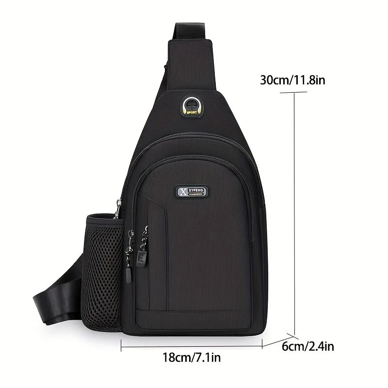 Black Oxford fabric chest crossbody bag featuring a zipped front compartment and a side mesh water bottle holder.