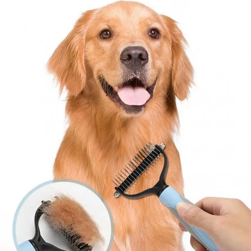 A hand holding a blue and black dual-sided dog grooming rake against a golden retriever, showing removed fur.