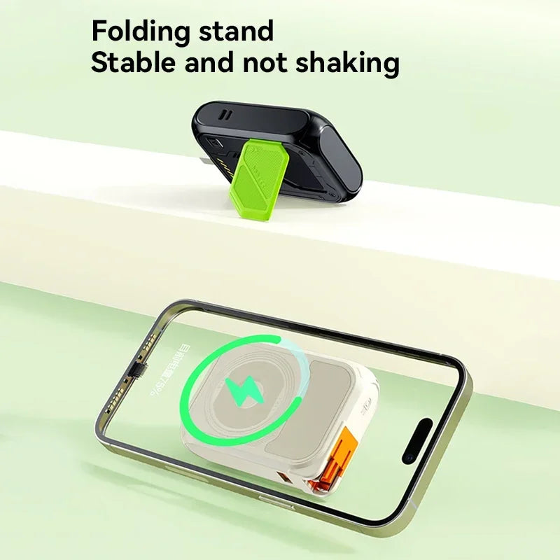 A sleek black 10000mAh magnetic wireless power bank featuring a fold-out lime green stand, shown charging a smartphone.