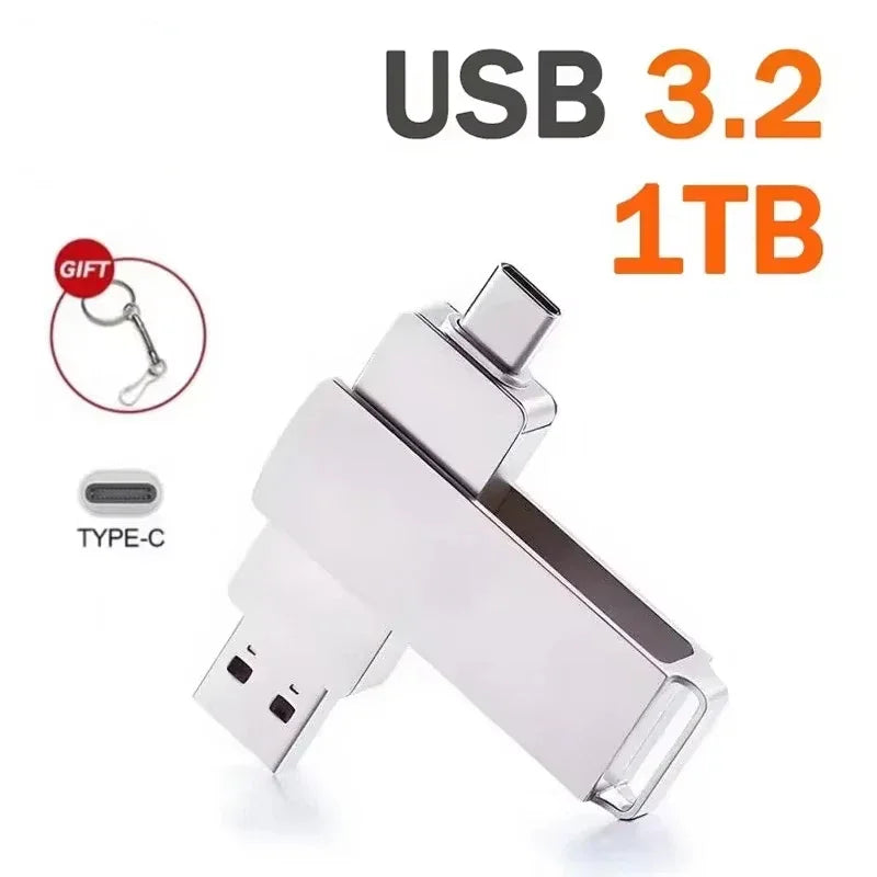 Silver 1TB USB 3.2 2-in-1 flash drive with USB-A and Type-C connectors, plus a free keyring gift.