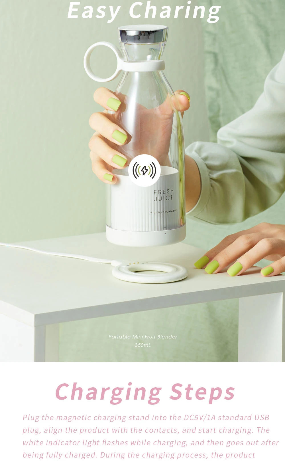 A white portable mini blender with a transparent bottle being charged on a magnetic circular white base.