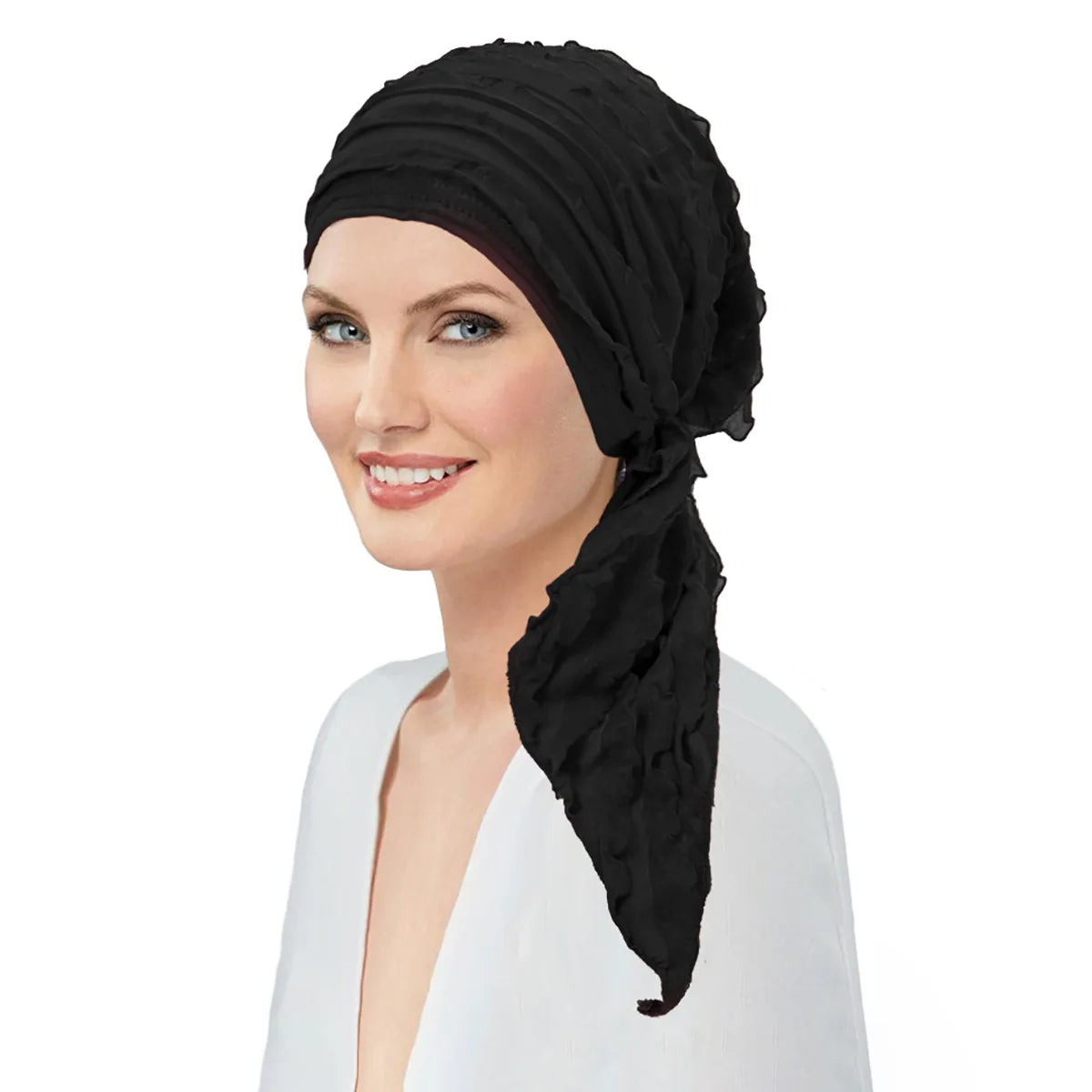 Model wearing a black, pre-tied elasticated ruffle turban head wrap with a decorative side scarf detail.