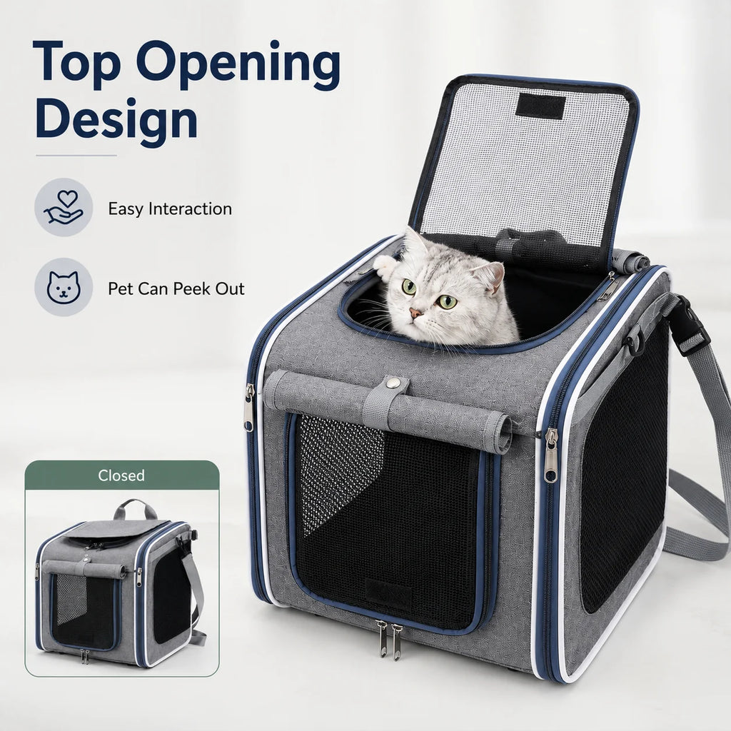 Gray pet carrier backpack with mesh windows and open top, showing a cat looking out.