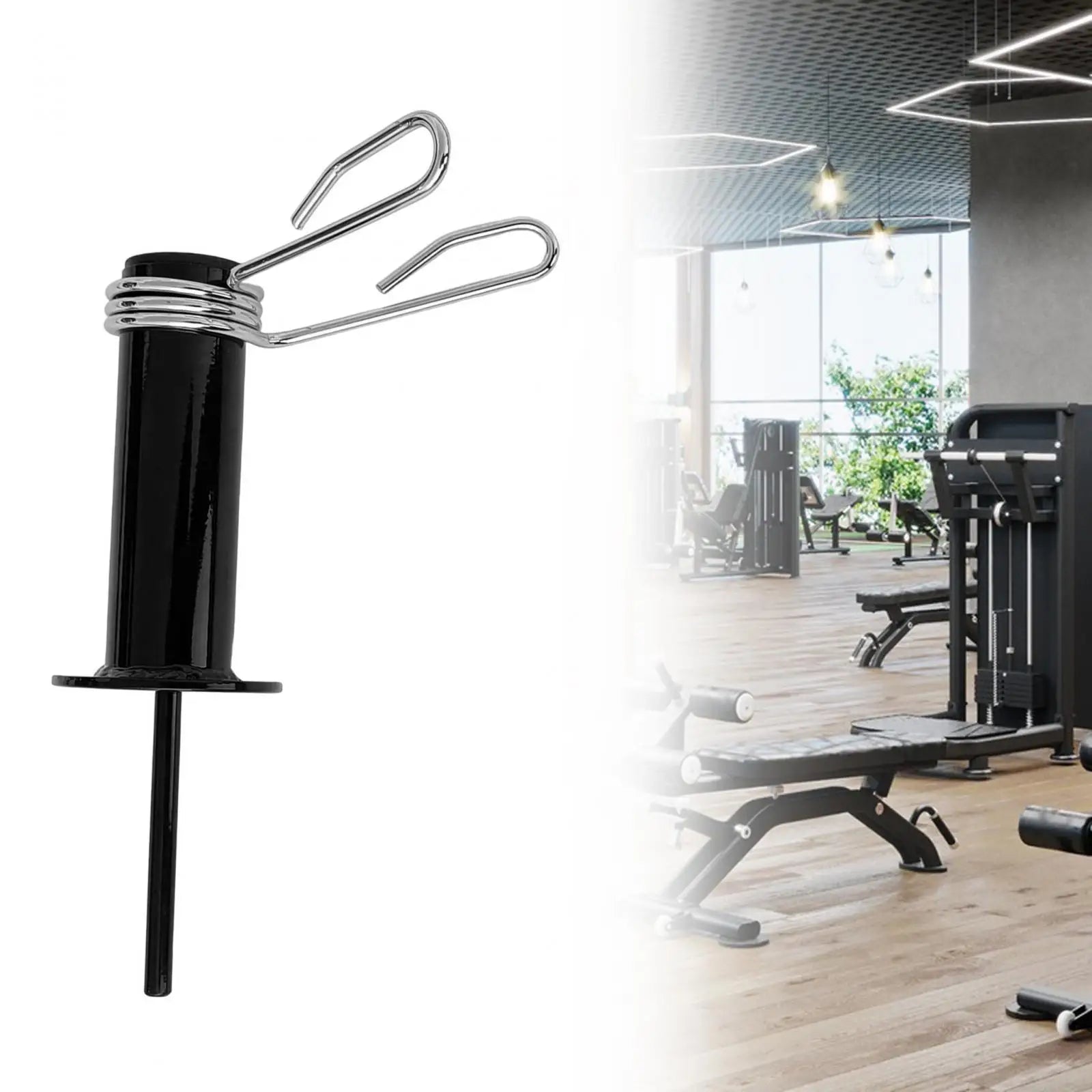 Black steel weight stack loading pin with a chrome spring clip, set against a blurred gym interior background.