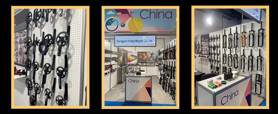 A trade show display by Dongguan Kailun Bicycle Co. featuring walls of black bike cranksets and suspension forks.