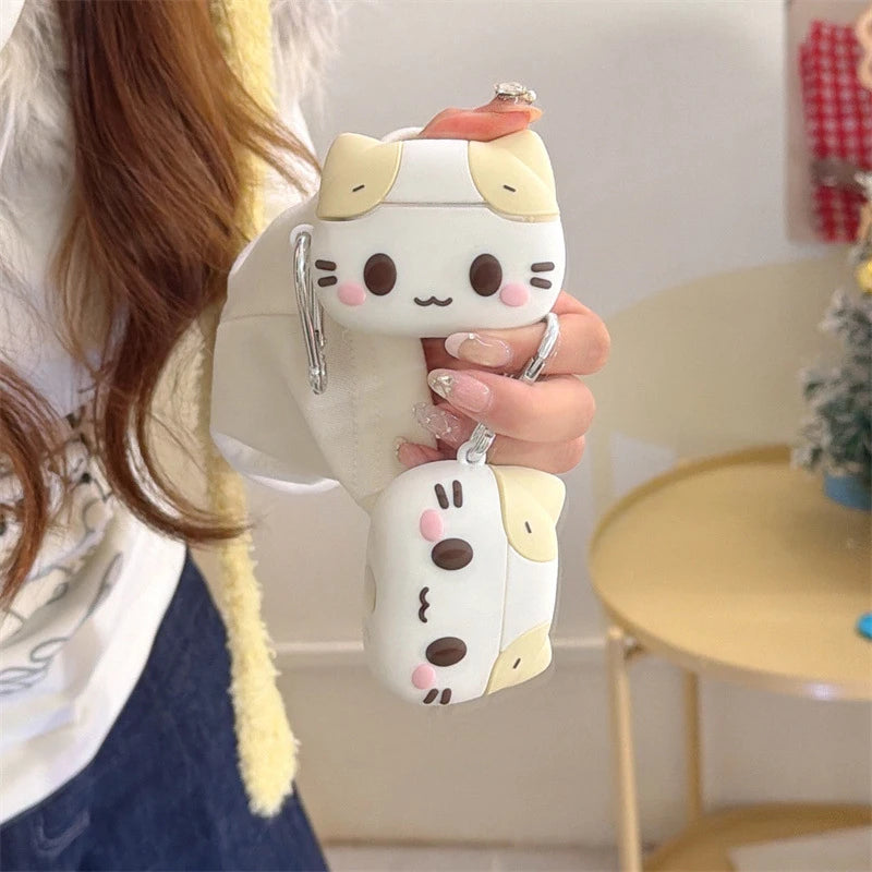 Cute white silicone cat AirPods case with cream accents and a handy metal carabiner clip.