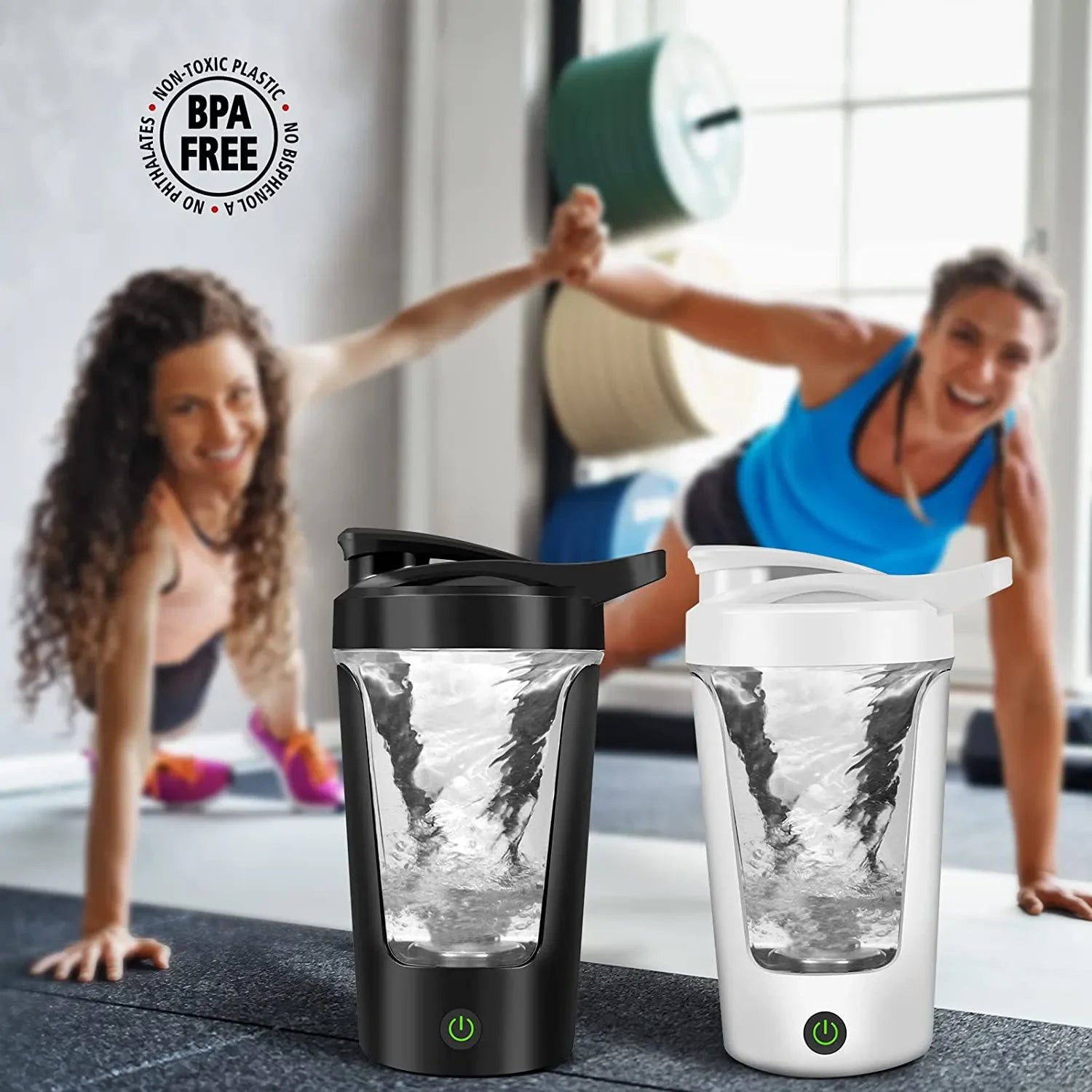 Black and white electric portable shaker bottles with a swirling vortex inside, displayed in a gym setting.