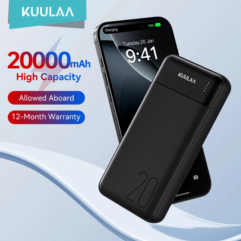 Sleek black 20,000mAh portable power bank with a textured finish and LED battery indicator, charging a smartphone.