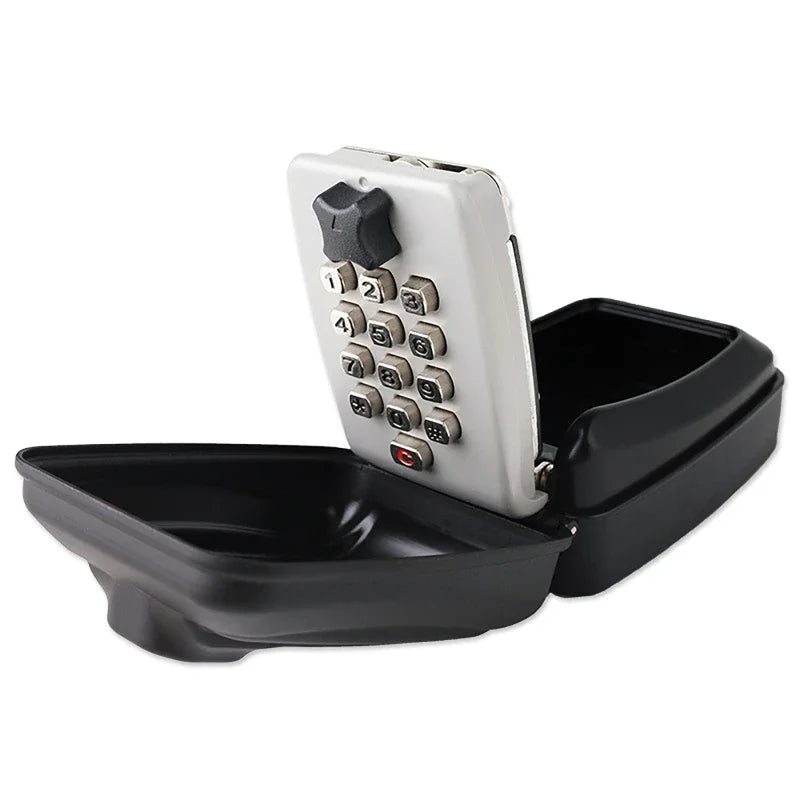 Open black metal wall-mounted key lock box with grey push-button combination keypad.
