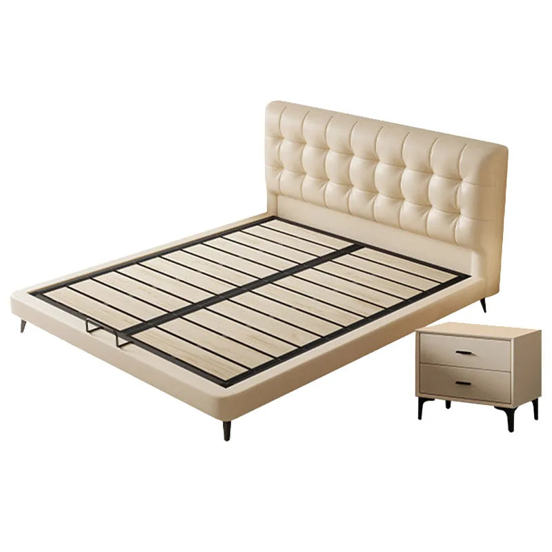 Minimalist cream upholstered bed frame with a tufted headboard, wooden slats, and a matching two-drawer bedside table.