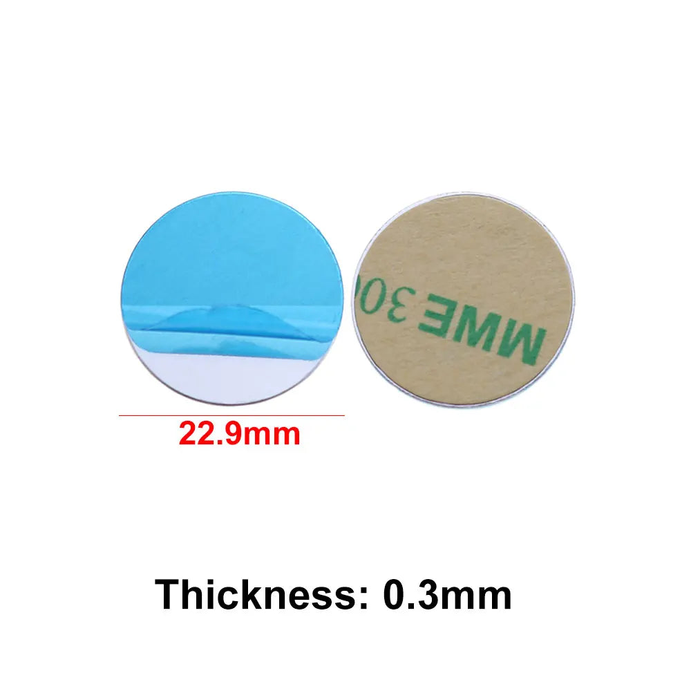 Two 22.9mm round, silver adhesive metal plates with blue protective backing and beige adhesive sides.