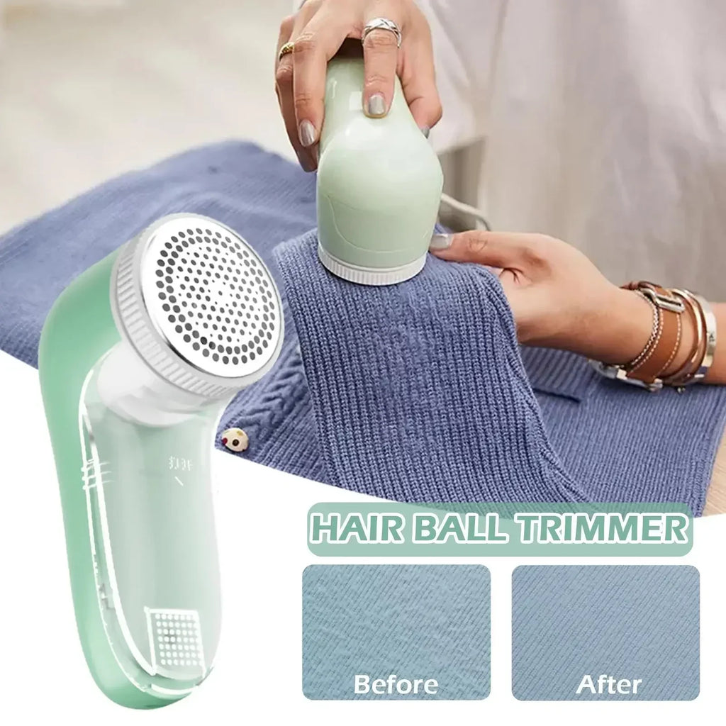 Sage green fabric bobble remover in use on a blue jumper, showing before and after results.