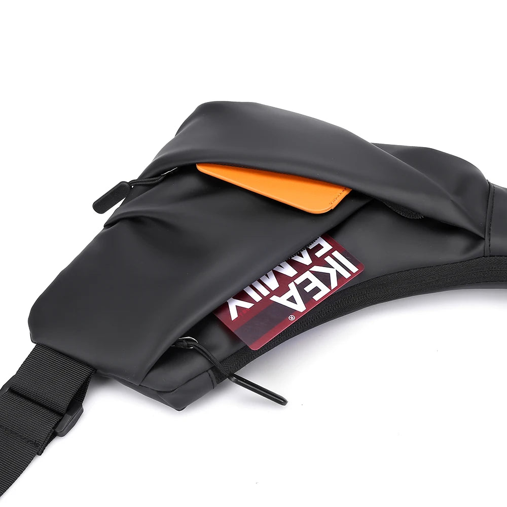 Black triangle-shaped crossbody chest bag with smooth, water-resistant finish, zip pockets, and an adjustable strap.