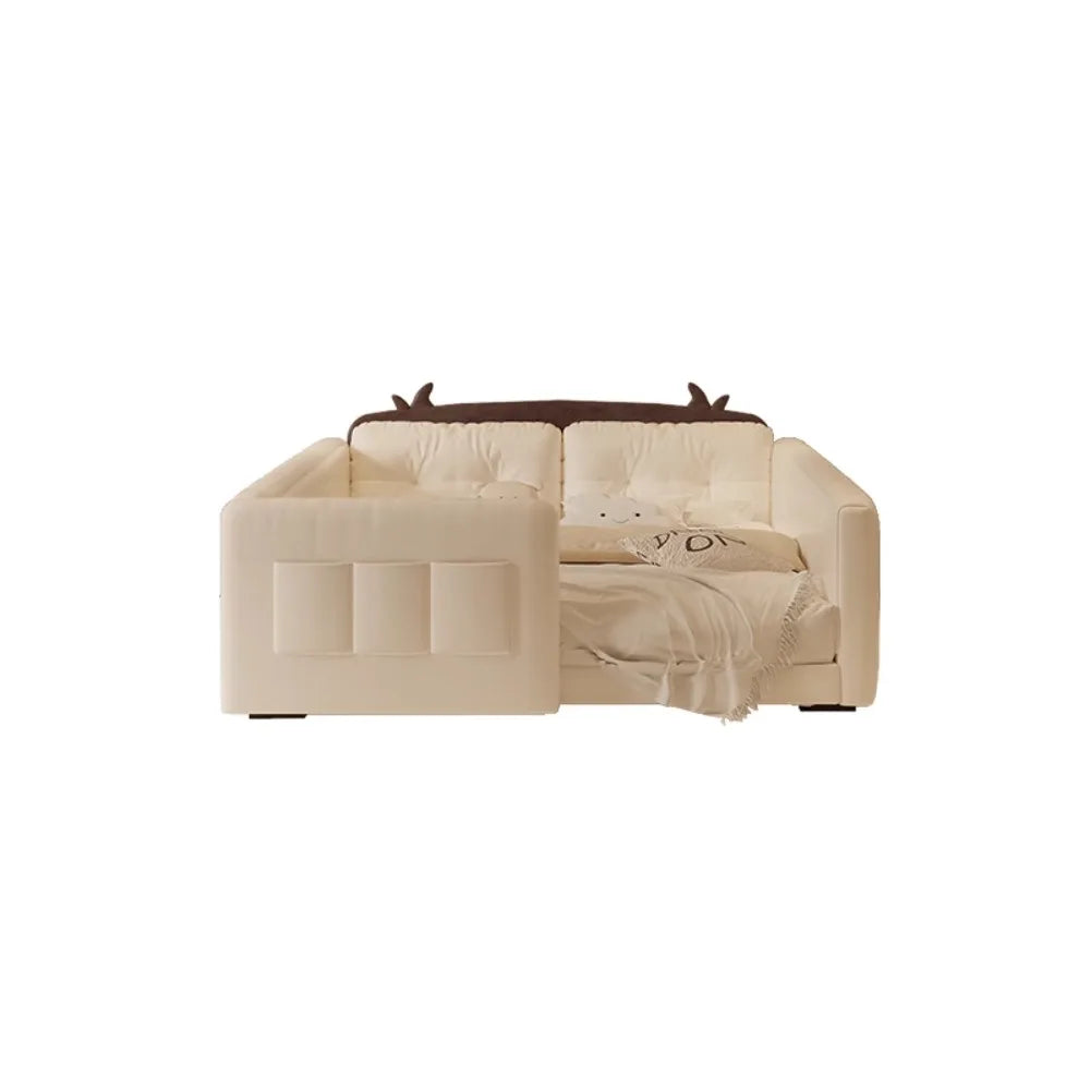 Cream-coloured parent-child bed with cow-themed headboard, protective guardrails, and cushioned side storage.