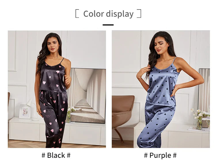 Women’s satin pyjama sets with heart prints, featuring a camisole top and trousers in black and purple colourways.