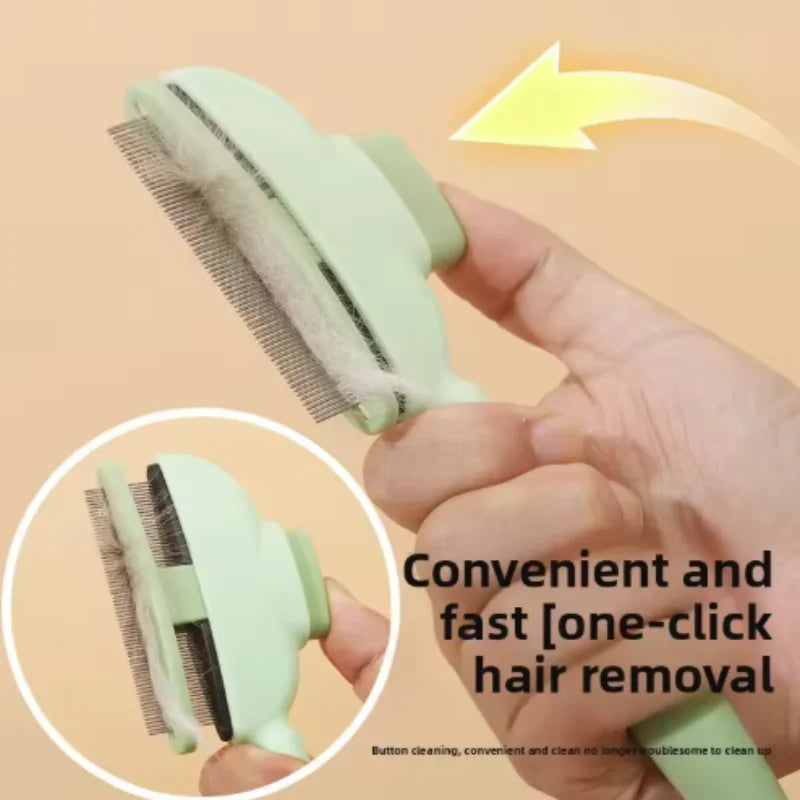 Pale green self-cleaning pet grooming brush with fine metal bristles, held by a hand.