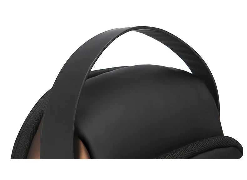 Close-up of a black, sleek anti-theft crossbody sling bag with a comfortable top handle.