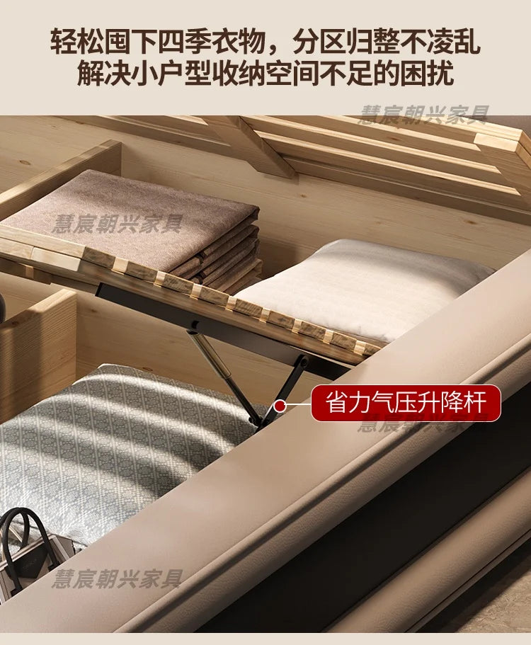 Beige leather bed frame with an openable slatted base, featuring hydraulic pistons for under-bed storage.