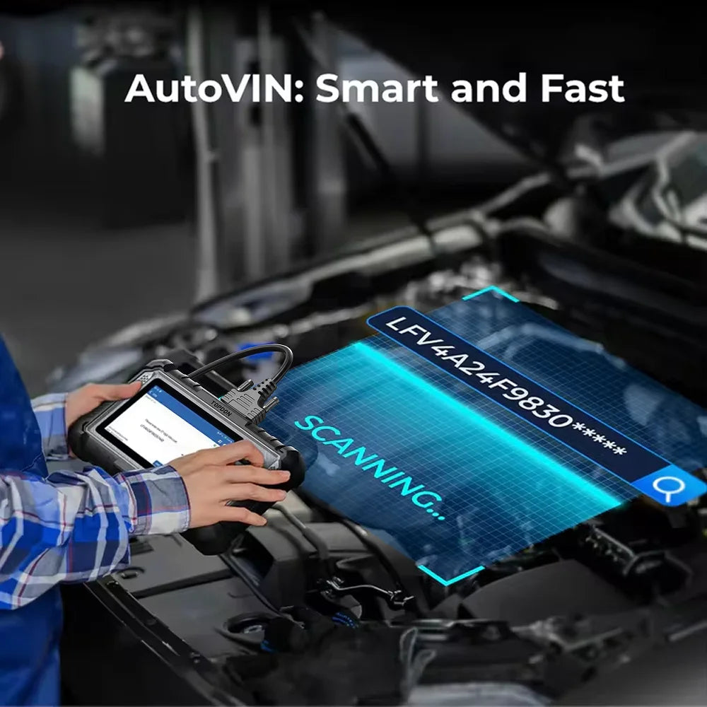 Black Topdon ArtiDiag500 car diagnostic scanner with a touchscreen, held over an open car engine, showing AutoVIN scan.