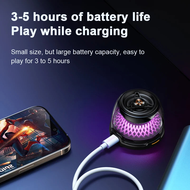 A small, black, magnetic portable Bluetooth speaker with purple glowing lights, connected to a charging cable.