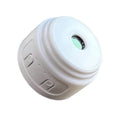 White plastic circular camera or sensor with a green lens and two side control buttons labeled Mode and On/Off.