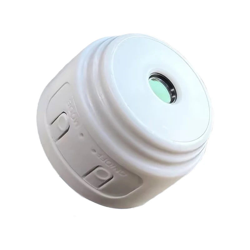 White plastic circular camera or sensor with a green lens and two side control buttons labeled Mode and On/Off.