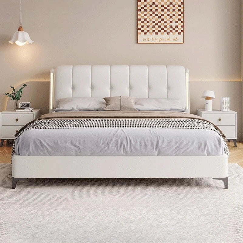 Minimalist cream white storage bed frame featuring a vertical-tufted headboard with integrated side lighting.
