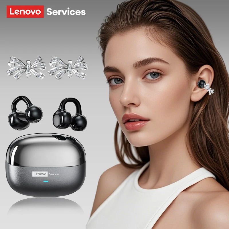 Black wireless ear cuffs featuring decorative crystal-encrusted silver bows, shown with a matching charging case.