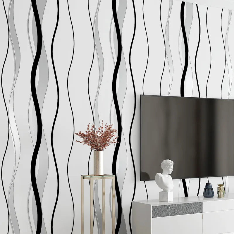 Modern wallpaper featuring bold black and soft grey vertical wavy stripes on a crisp white background.
