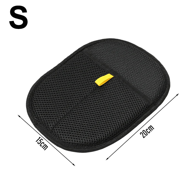 Small oval black mesh cleaning mitt with a yellow tab, labelled 15cm by 20cm.