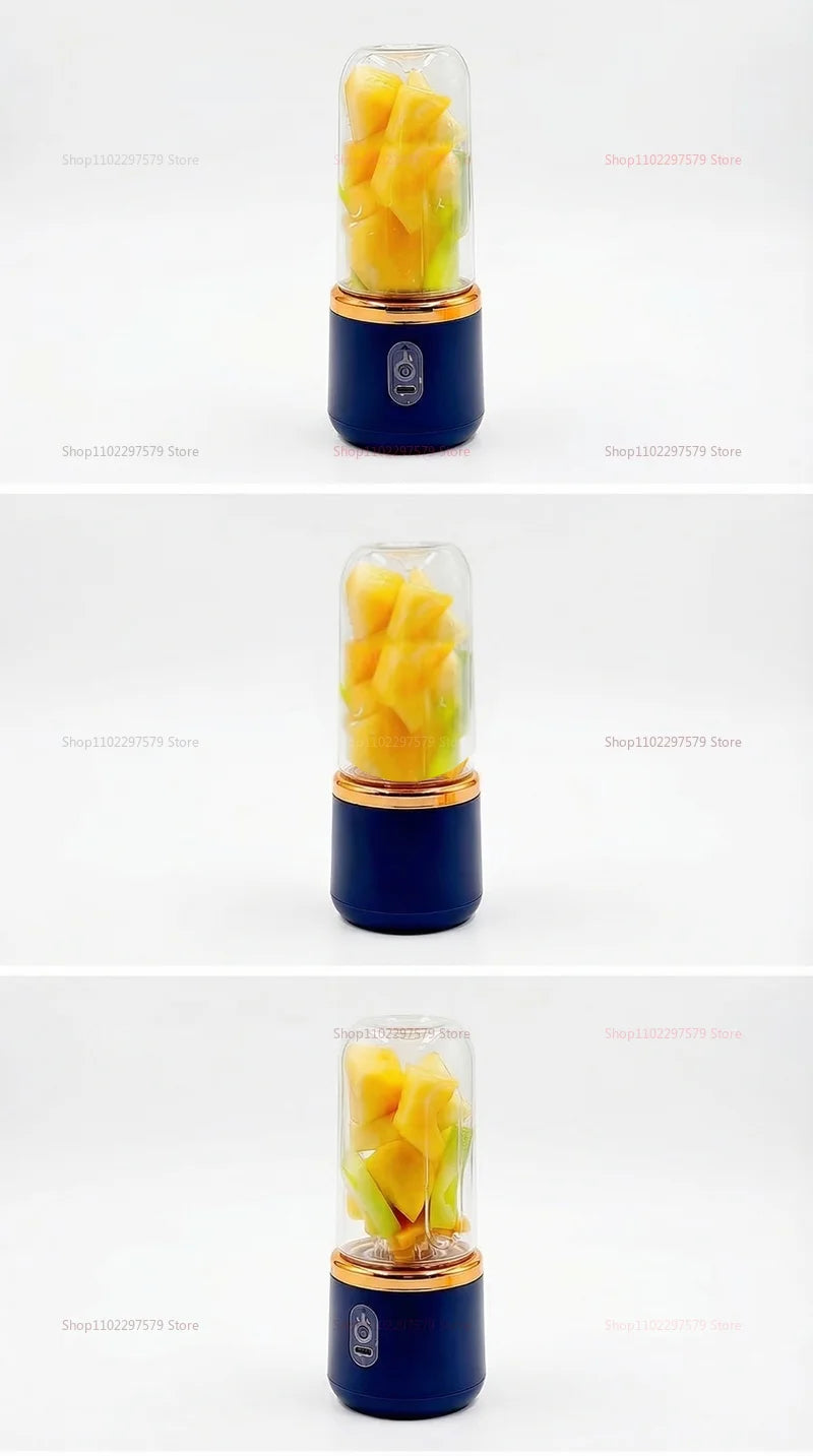Portable blender in navy blue with a gold metallic rim and clear glass cup filled with diced fruit.
