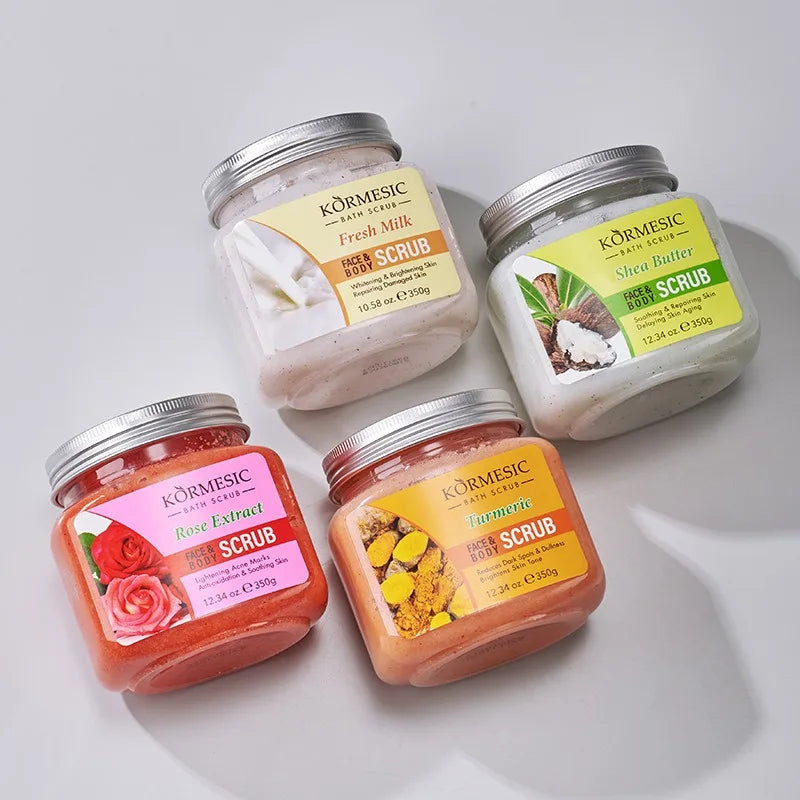 Four 350g jars of face and body scrub in Fresh Milk, Shea Butter, Rose Extract, and Turmeric scents.