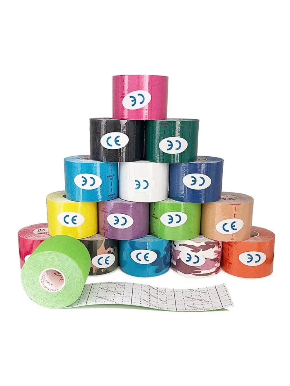 A pyramid of assorted colourful kinesiology tape rolls, some solid colours and some with camouflage patterns.