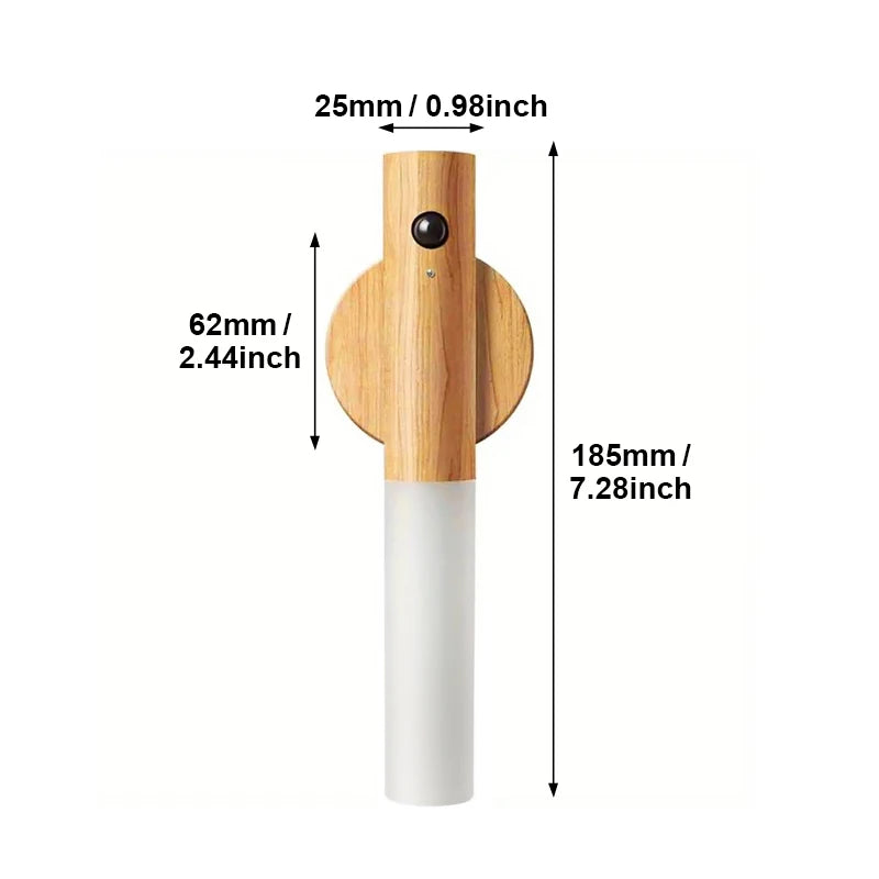 Light-wood motion sensor LED night light with a frosted white shade, shown with height and width measurements.