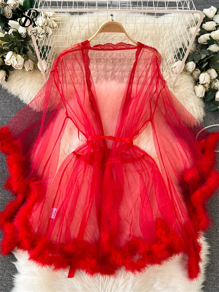 Red sheer long-sleeve robe featuring fluffy faux fur trim, a lace back neck, and a matching waist tie.