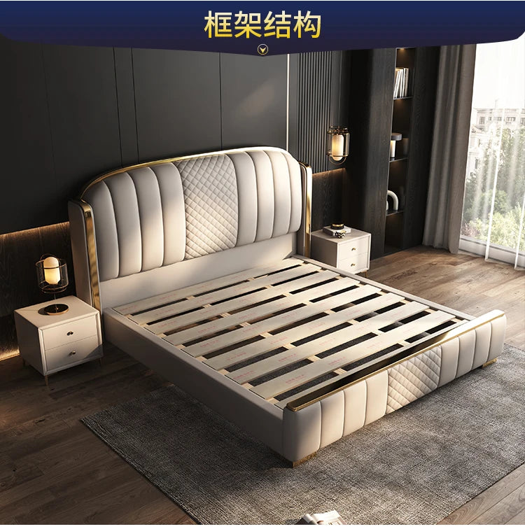 A modern cream upholstered bed frame with gold accents, channel-tufted headboard, diamond detailing, and wooden slats.