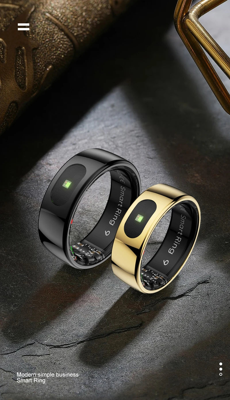 Black and gold smart health tracker rings with internal sensors for sleep and heart rate monitoring on a textured base.