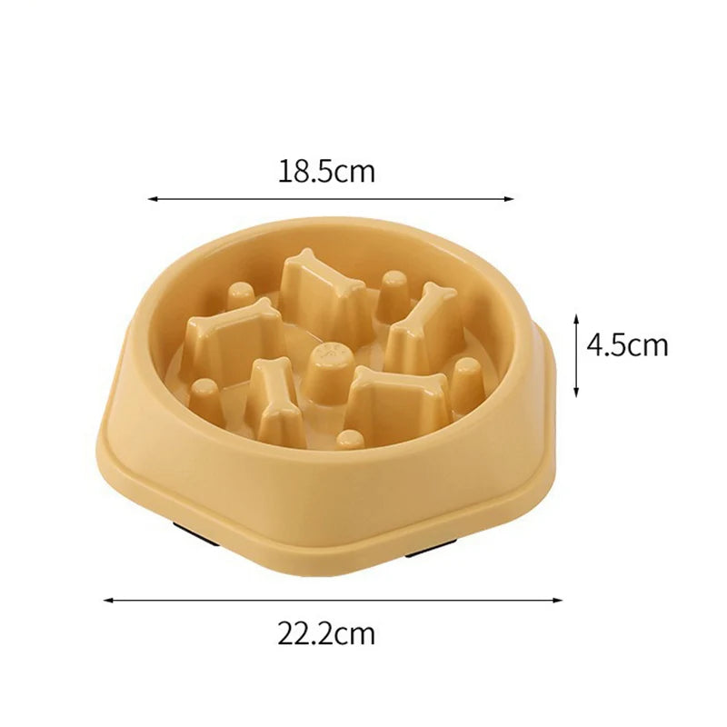 Tan-coloured pet slow feeder bowl with bone-shaped obstacles and dimensions labeled.