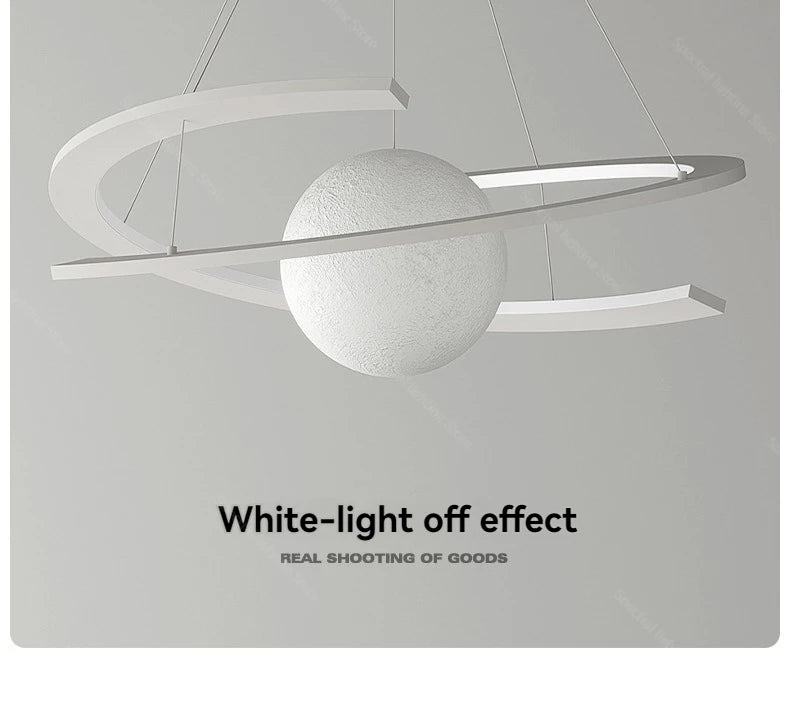 Modern white pendant lamp with a central textured sphere surrounded by two elegant, curved orbital rings.