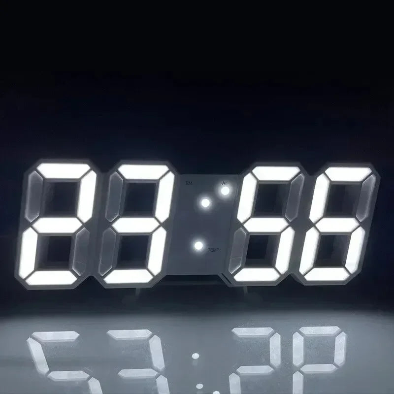 Modern LED digital alarm clock with bright white, block-style numerals set against a sleek black background.