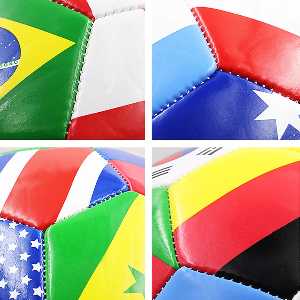 Close-up of a football with multi-coloured stitched panels featuring various international flag designs.