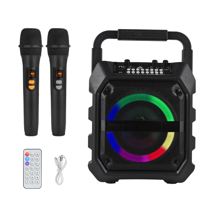 Black portable speaker with a multi-coloured LED ring light, two wireless microphones, remote control and USB cable.