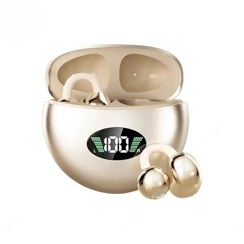 Champagne gold wireless ear cuffs with a matching charging case featuring a digital battery display.