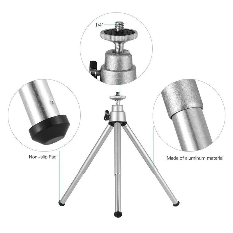 Silver aluminum mini tripod with 1/4" screw ball head and non-slip rubber feet for cameras or projectors.