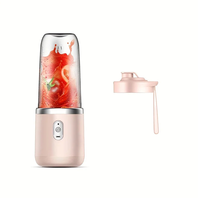 A portable, pale pink personal blender filled with blended red fruit, shown with a matching detachable lid.