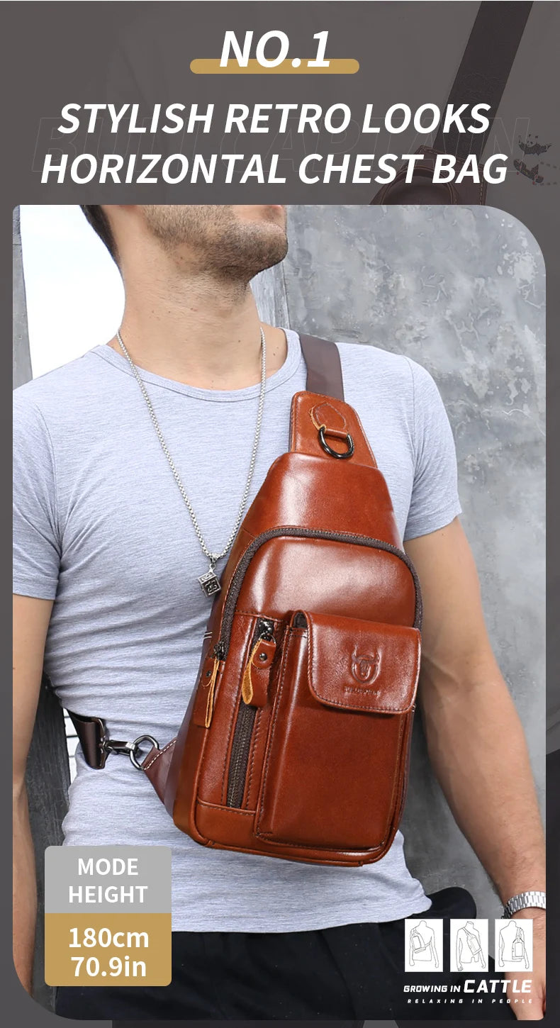 A tan leather retro-style crossbody sling bag with zip pockets, worn across the chest by a man in a grey t-shirt.