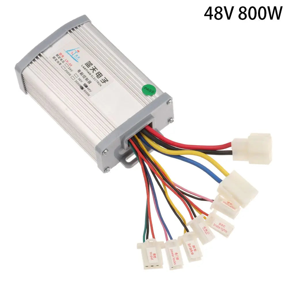 Silver rectangular e-bike brushed controller with gray end caps and multiple multi-colored wires with white connectors.