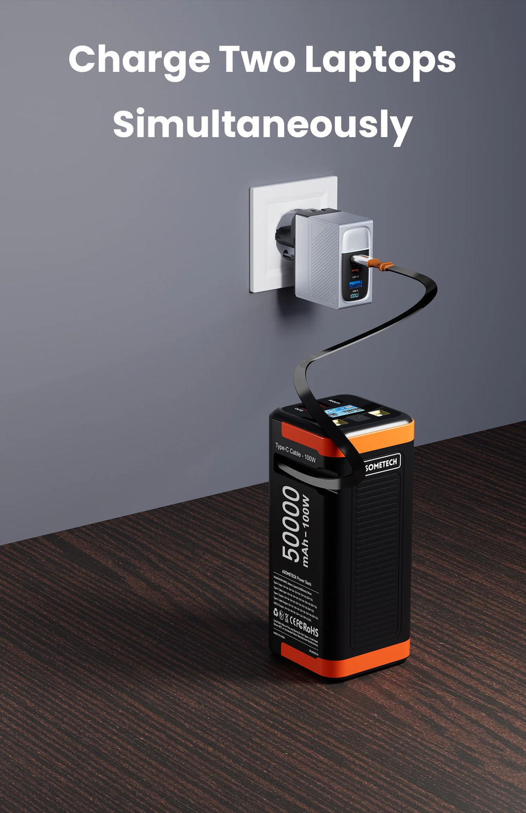 Black and orange 50000mAh 100W power bank charging via a wall adapter, featuring a digital display and multiple ports.