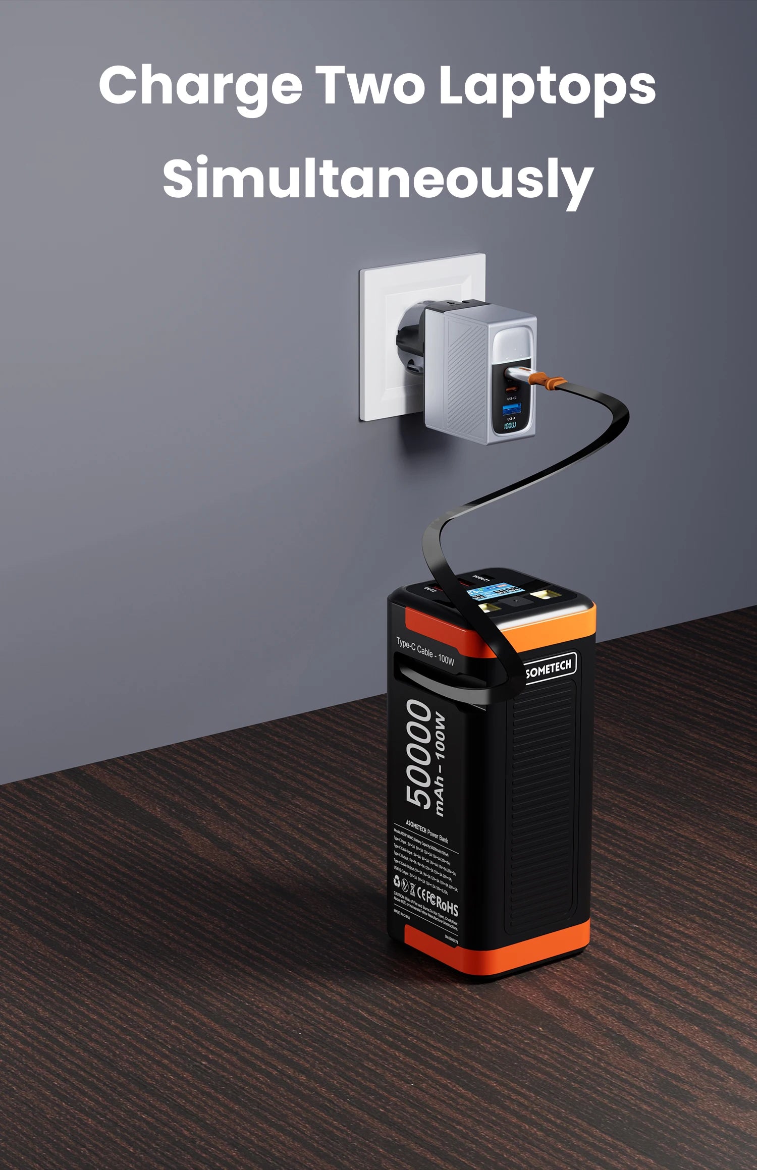 Black and orange 50000mAh 100W power bank charging via a wall adapter, featuring a digital display and multiple ports.